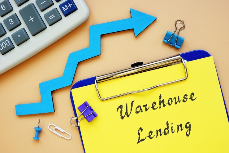 Warehouse Lending phrase on the piece of paper.