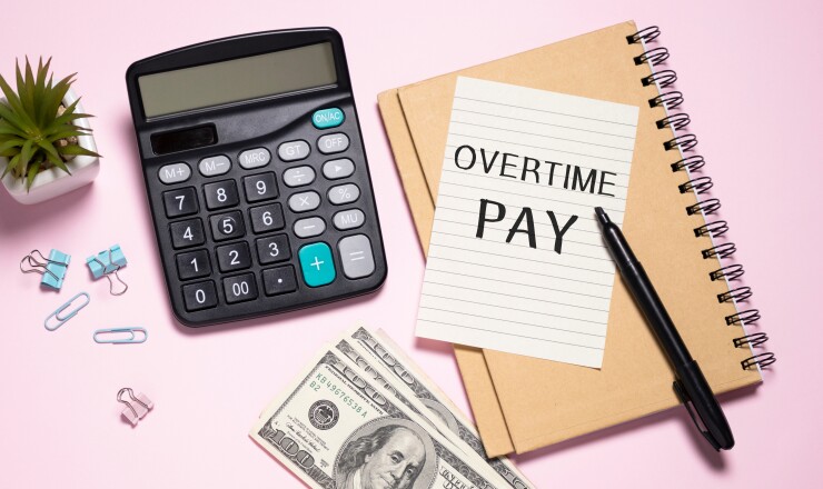 Text sign showing hand written words Overtime pay