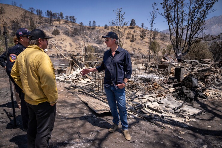 California Gov. Gavin Newsom surveys wildfire damage